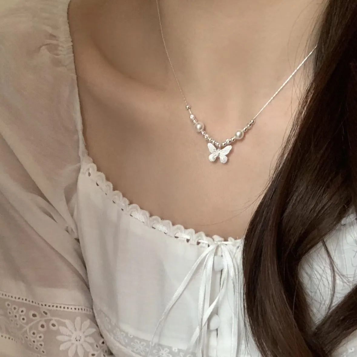 Silver Butterfly Pearl Pendant Necklace โ Light Luxury Fashion Birthday Gift