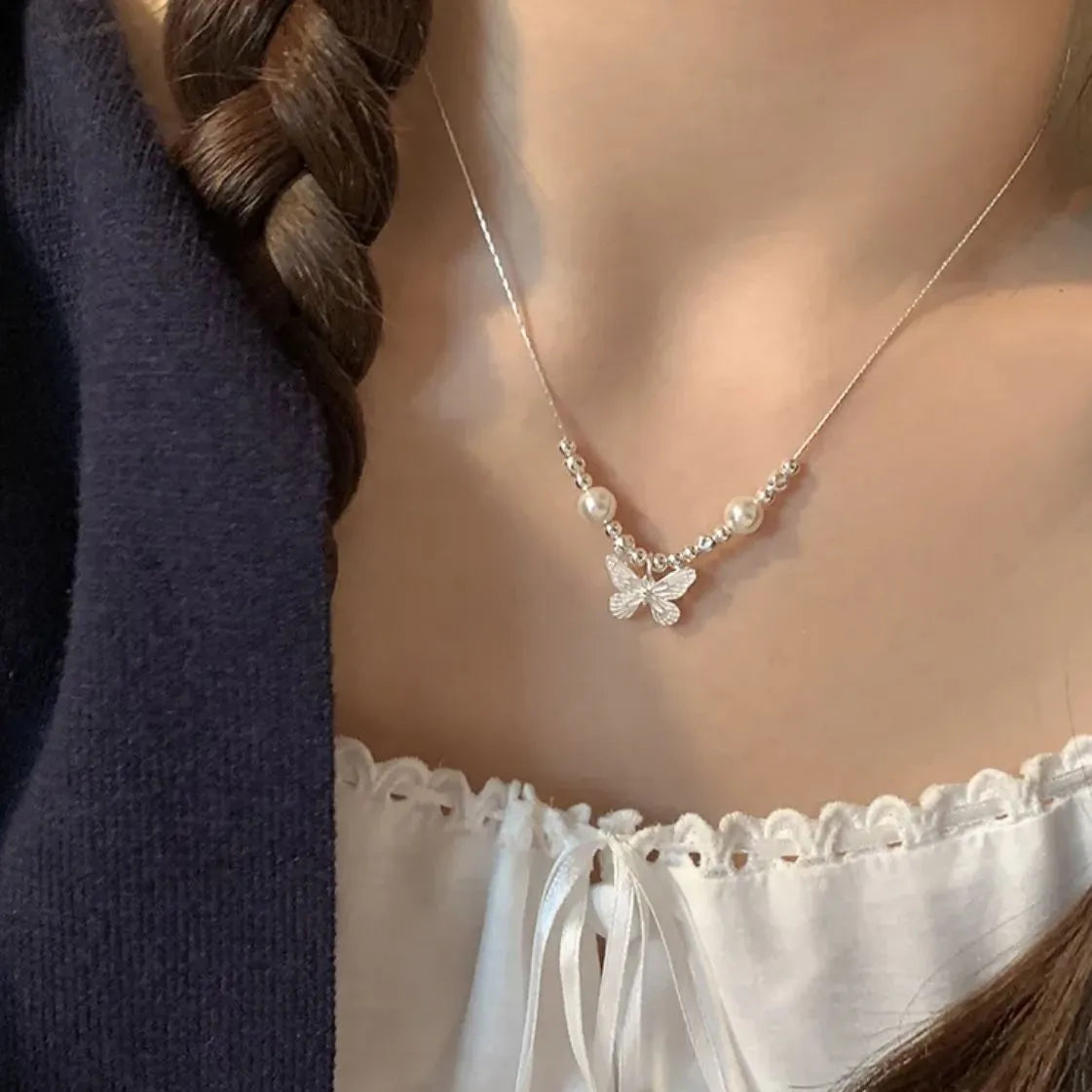 Silver Butterfly Pearl Pendant Necklace โ Light Luxury Fashion Birthday Gift