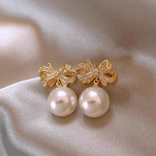 Gold 10mm Freshwater Pearl Bowknot Light Luxury Fashion Earrings with Diamond-like Sparkling Zircon