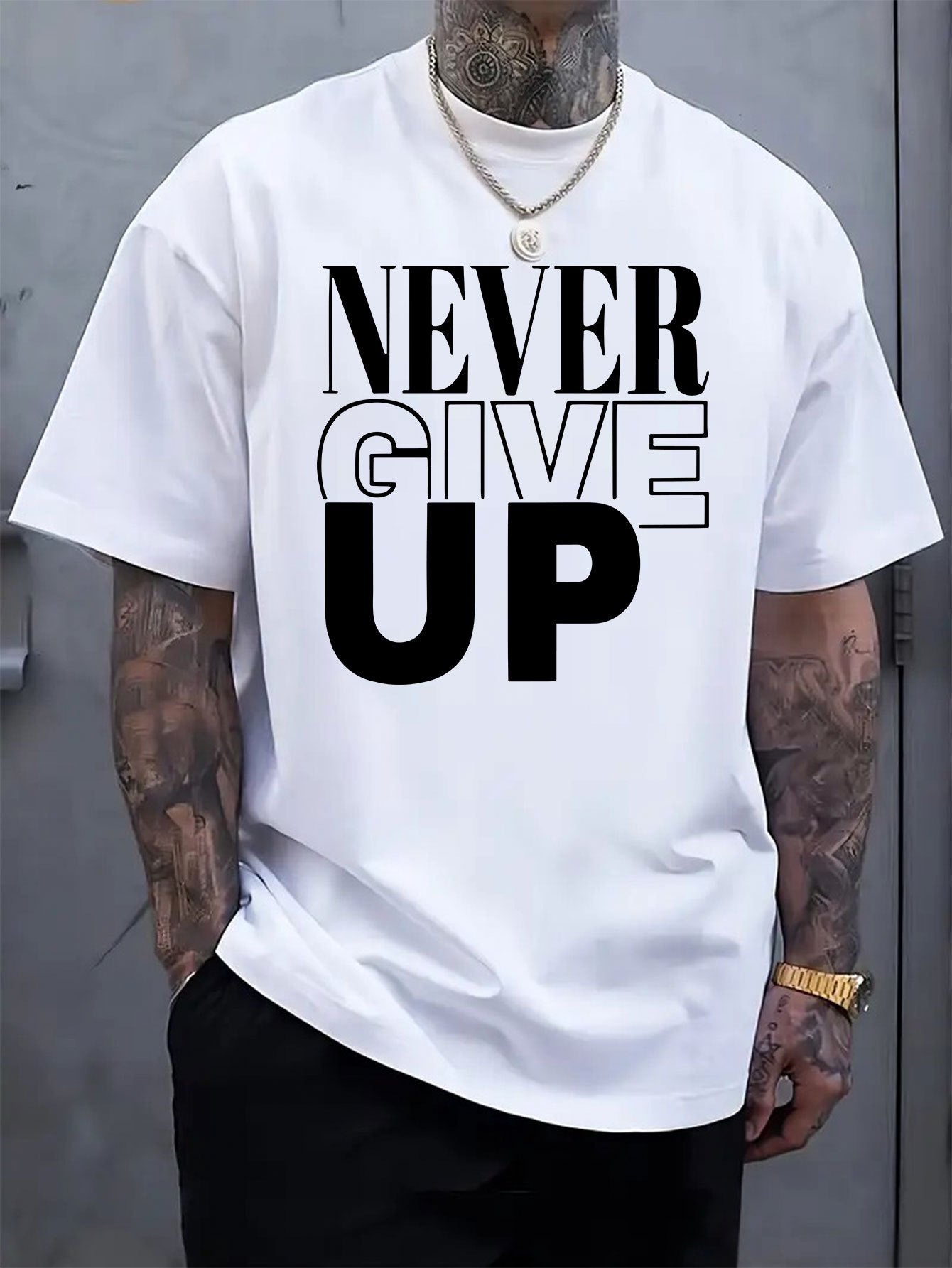 "Never Give Up" motivational graphic art print T-shirt – loose and breathable, round neck design, best-selling across the internet