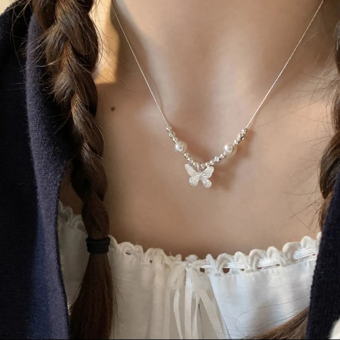 Silver Butterfly Pearl Pendant Necklace โ Light Luxury Fashion Birthday Gift