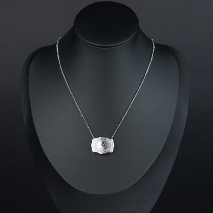 Luminacore Initial Letter Pendant Necklace with Embossed Belt Buckle, 2 Chains Included, Rhodium-Plated, Tarnish-Resistant, 18" Extender Length